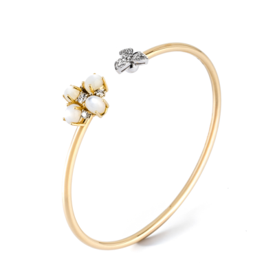 Bracciale in oro giallo e bianco con madreperla e diamanti